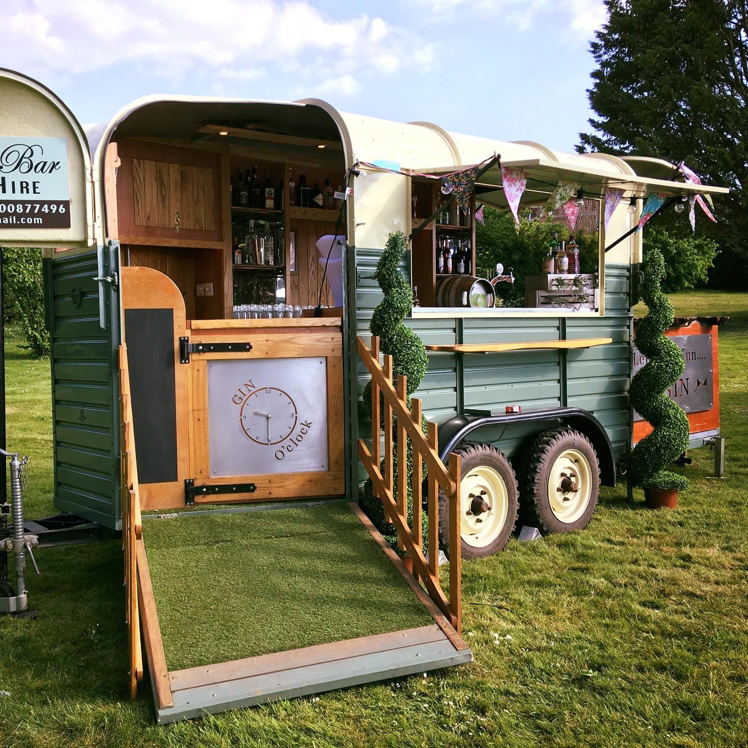 The Horseless Bar vintage horsebox with ramp and gin o'clock door